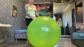 Looner Val ride on green beachball