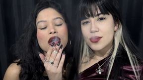 Two Brazilian Goddesses smoking cigarettes together