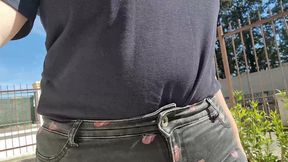 very rare and expensive jeans pierced by a rusty nail