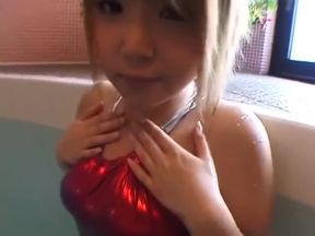 Fooled by Chrome: Asian Babe in Lustrous Red Wet Suit