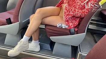 Busty lady masturbates openly on a bus