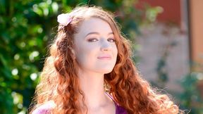 Playful redhead model Abbey Rain jumps on a long dick