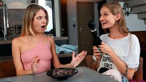 Rebecca Volpetti and Tiffany Tatum are playing with a toy