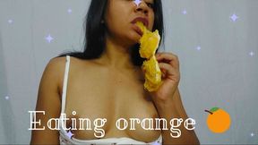 Eating an orange