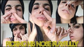 Picking his nose playfully!