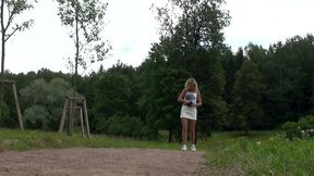 pretty blonde lorine taking photographs showing up