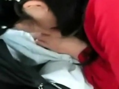 Asian older couple in the car