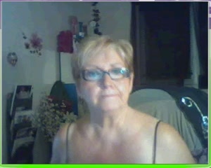 Short haired mature blonde lady flashed her huge boobies on webcam