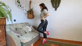 one shoe hopping in leather pants