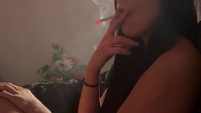 Smoking in red latex dress