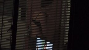 Amateur neighbor strips and dances in front of window