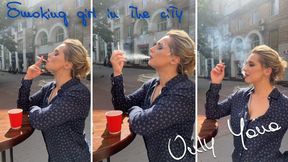 Smoking girl in the city