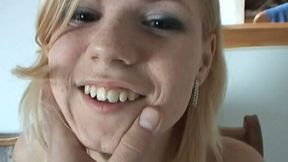 Cute blonde chick Cherie gives a head in the kitchen
