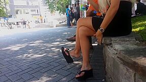 Sexy Blonde Babe Caught Dangling Her Black Shoe In Public