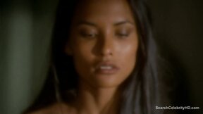 Luscious Laura Gemser and Monica Zanchi in a steamy scene