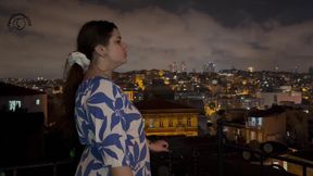 Smoking on the Balcony with a City View