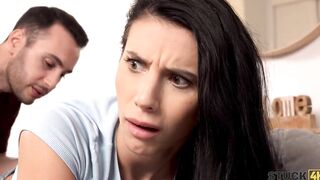 STUCK4K. Babe Romanian dark hair Nelly Kent is stuck