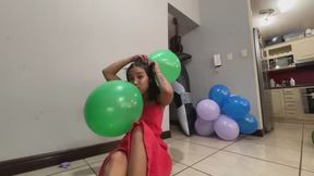 Akina hangs balloons on her head