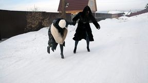 Two hot hotties in high heels slip and fall in the snow