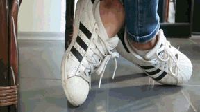 In sneakers, looking under the table MP4(1280x720)FHD