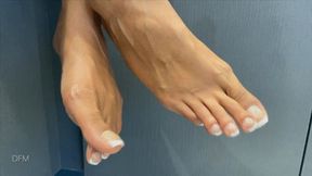 "Dangle french toes on work counter"