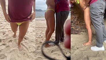 Belinha dando na praia movimentada dentro da gruta