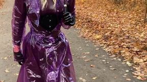 Rainy Park stroll Rubbermissy walks in public in purple rubber catsuit with shiny transparent PVC raincoat, latex mask, wellies