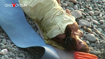 Beach Voyeur. Naughty teen couple sunbathing and fucking