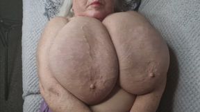 Busty Sarita's massive melons jiggling and bouncing in slo mo