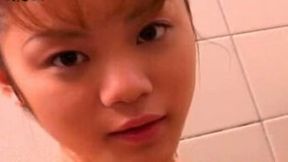 Cute petite Japanese girlie takes shower flashing her nice ass and titties