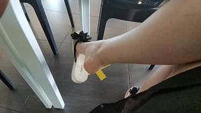 Shoes Off on Public Train Car Floor, Multiple Onlookers, Unwanted Attention Guaranteed