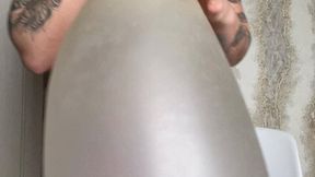 girl in leggins blow big long balloon