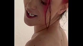 Lexi plays with her kitty in the shower