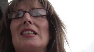 German mature lady Klaudia in nylons plays with her shaved pussy