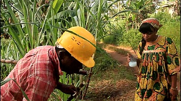 In the field with a palm wine picker who finds me defriche the field and we ended up kissing on the spot