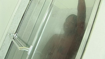 She has several tattoos that you'll see when she's in the shower, using a dildo to...