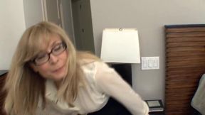 Busty cougar seduces in stockings and a garter
