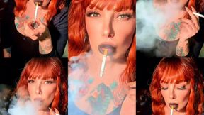Close-up of a redhead and her black lips smoking a yellow Camel - Audible Inhales and exhales