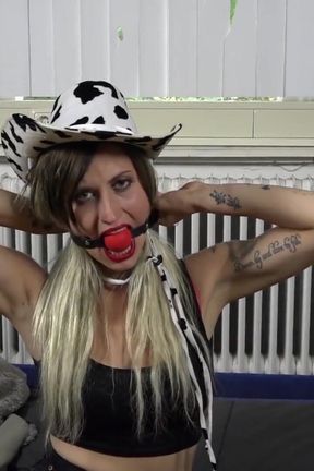 Trying out her new mouth gag