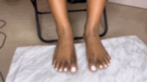 Big Foot Paints Her Toenails White