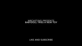 Babydoll comes to test a toy and waters plants