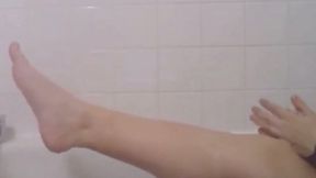 Foot dripping wet cleaning feet and playing