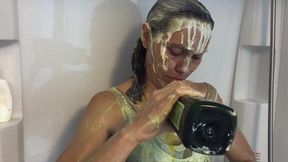 oiled and creamed hot girl gunged in a holiday caravan game