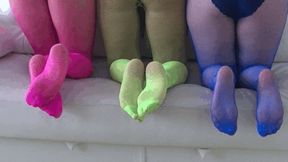 Playing legs in colorful fishnet tights a
