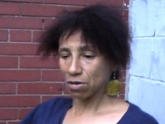 Nasty black lady drops her pants and reveals her hairy cunt