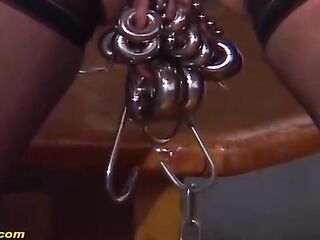 Kinky, German aged with a heavily pierced snatch got fastened up and stuffed with a sex toy