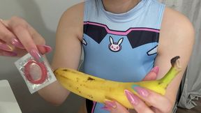 my stepsister puts a condom on the banana, plays with it, then sticks it in a fake pussy babe