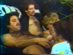 Two hairy men with big dicks feeding two chicks on cam