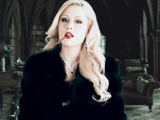 Large Titted Golden-Haired Smokin' Topless in Yiff Coat