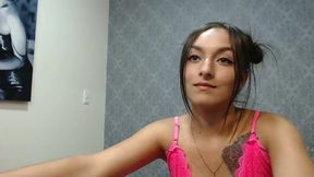 Tatted Up Loren Kiwt on Her Computer